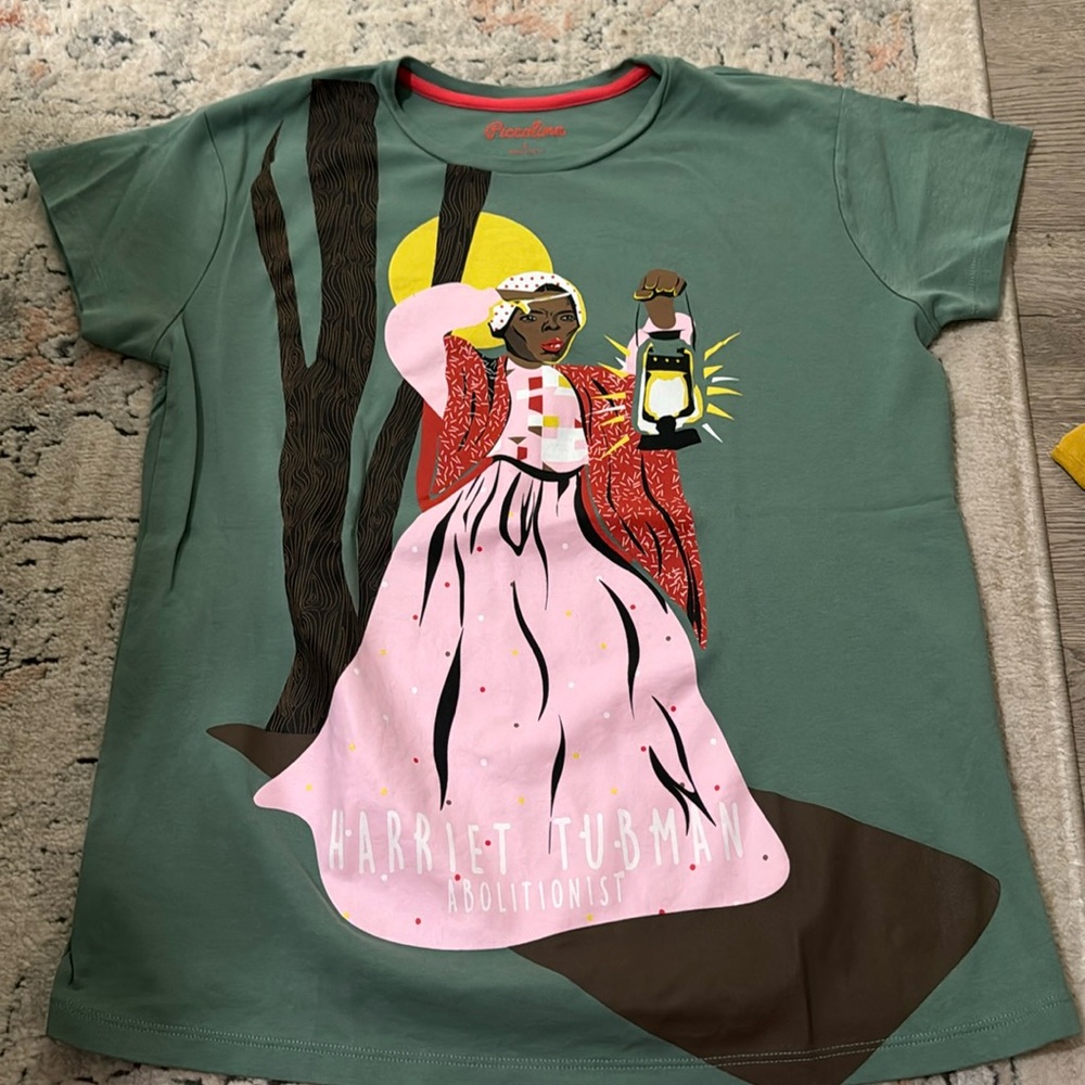 Piccolina Harriet Tubman shirt. Excellent condition.